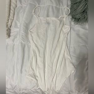 White body suit , tank top